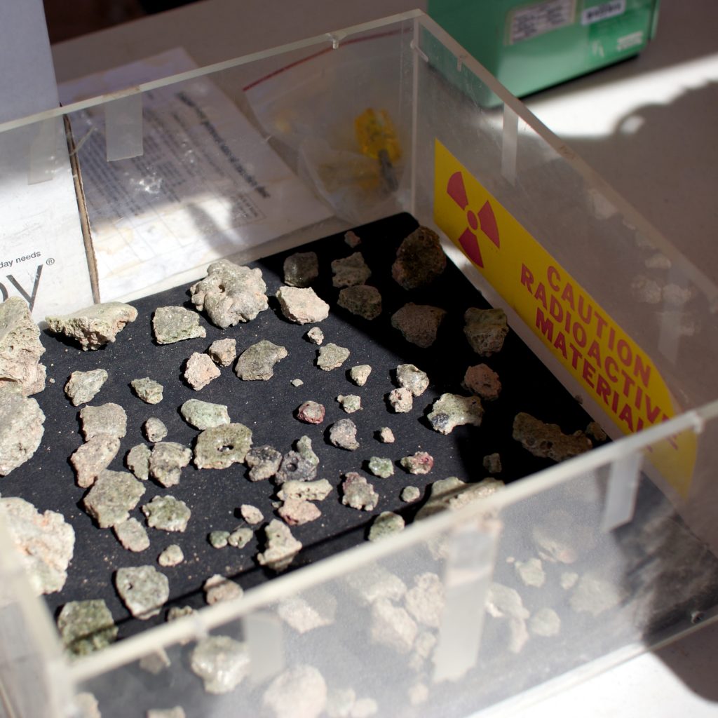 Trinitite samples in a box at the safety officer's tent.