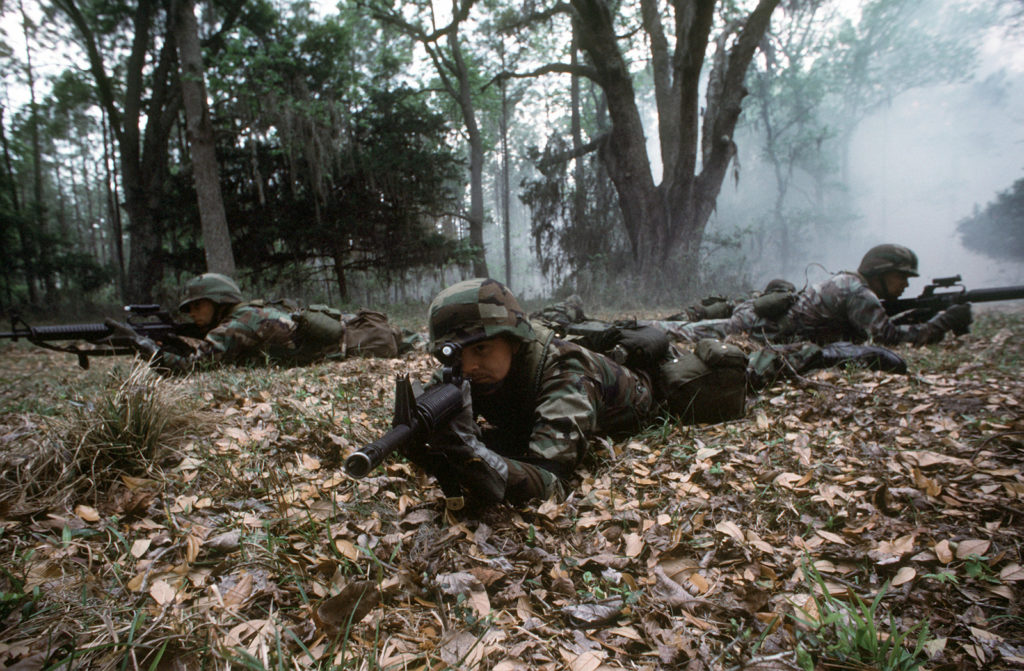 The 1990s. Marines of the Security Force Company practice with electronic sighting devices on their M-16A2 assault rifles during training in guarding the special weapons area of the submarine base.
