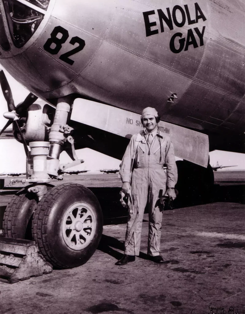Col. Paul Tibbetts Jr. poses in front of his B-29 Superfortress "Enola Gay"