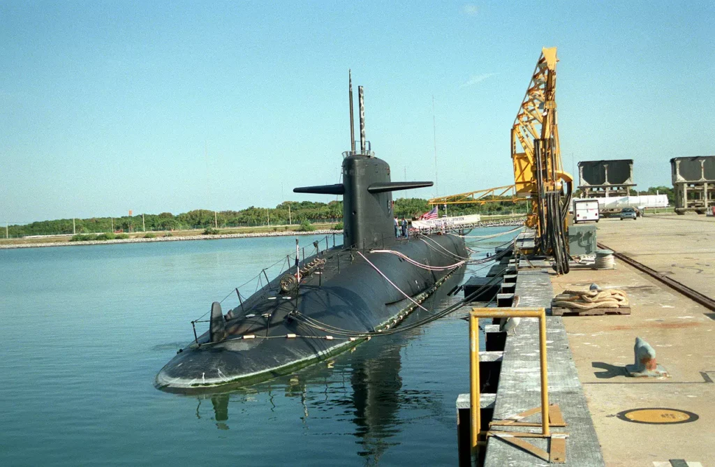 A port bow view of USS STONEWALL JACKSON (SSBN-634) at the Trident pier. She was the tenth submarine converted to POSEIDON C3.