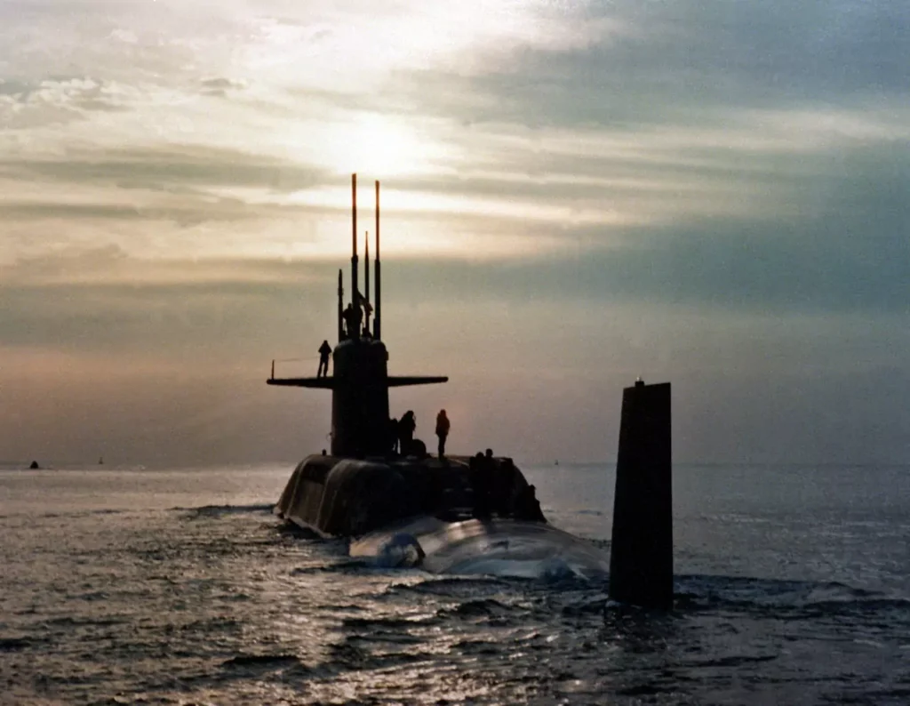 A port quarter view of USS DANIEL WEBSTER (SSBN-626) underway. She was the thirty-first and last submarine converted to POSEIDON.