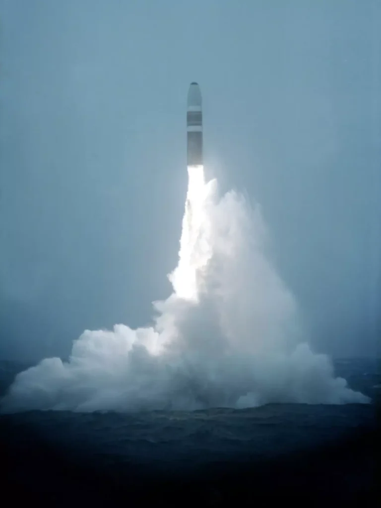 A Trident I (C4) missile is launched from USS GEORGE BANCROFT (SSBN-643) on April 24, 1982.