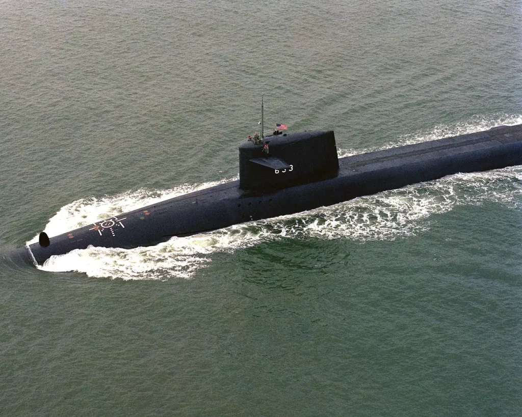 An aerial port view of USS CASIMIR PULASKI (SSBN 633). She was the twelve and last Poseidon submarine converted to carry Trident I (C4) missiles.
