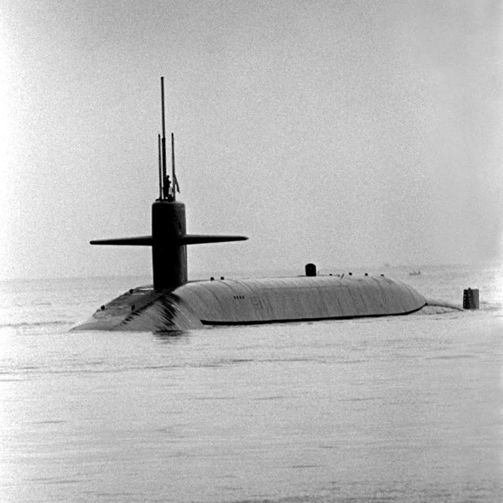 A port bow view of USS OHIO (SSBN-726) as it transits the Hood Canal. She was the first Trident Submarine and leader of her class. 