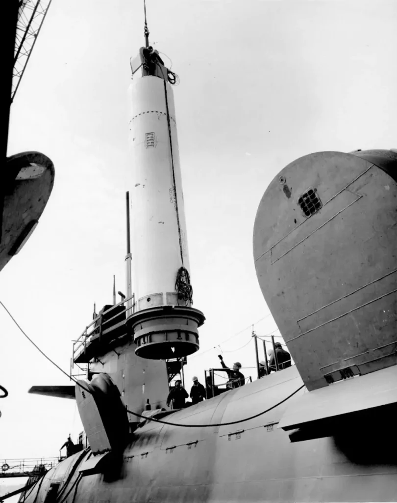 A Poseidon C3 is being loaded into a submarine launch tube. 