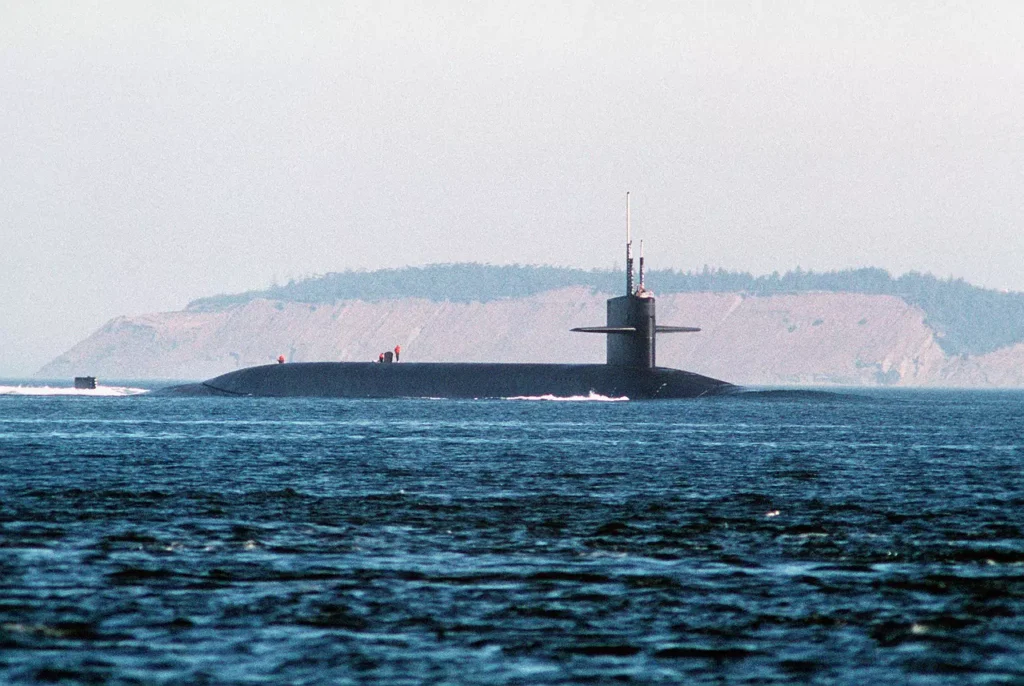 A starboard bow view of USS ALABAMA (SSBN-731) returning to port after completing the 100th Trident I (C4) submarine patrol.