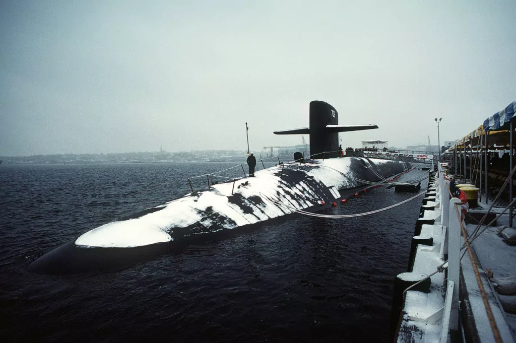 A port bow view of USS ALASKA (SSBN-732) during its commissioning. She was the seventh Trident submarine.