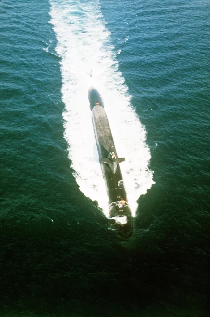 An overhead bow view of USS NATHANIEL GREEN (SSBN-636) off the coast of Hawaii. She was the ninth submarine to complete conversion to POSEIDON C3.